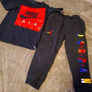 Jordan sweats and Nike shirt